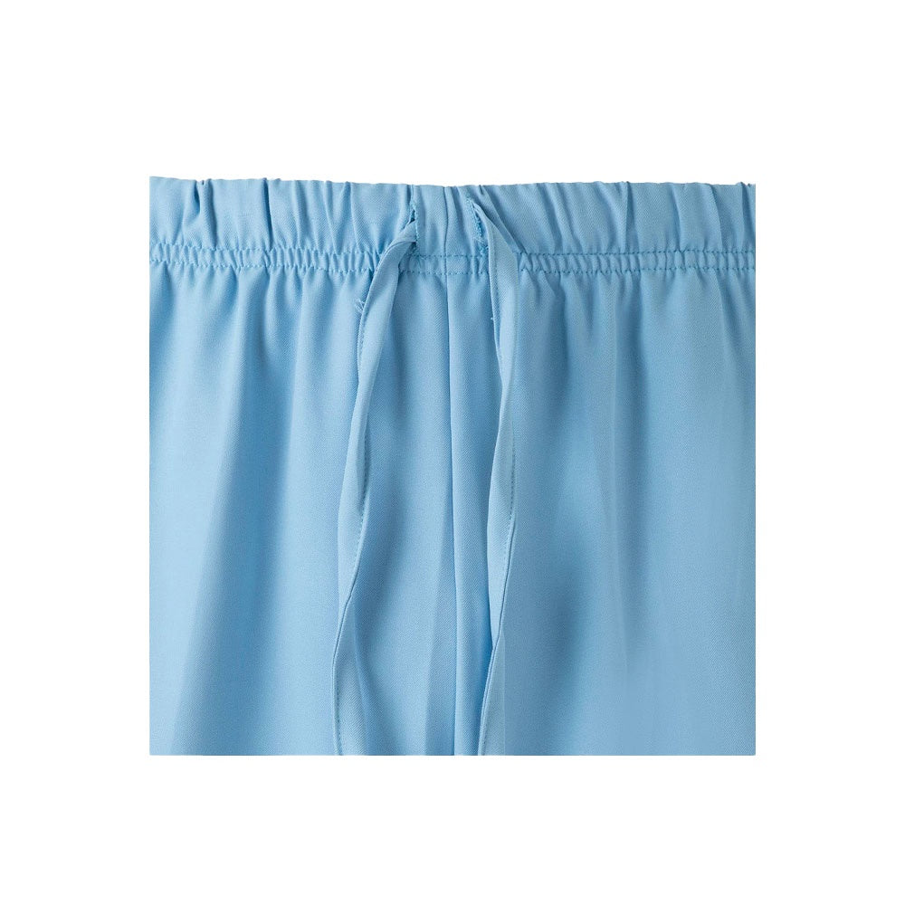 VL FREYR promotional workwear garment in pastel blue (detail view) with custom logo branding