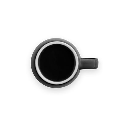 COMANDER promotional mug in black (detail view) with custom logo branding
