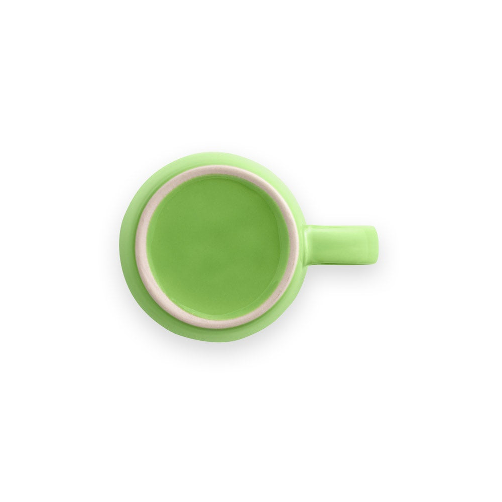 COMANDER promotional mug in light green (detail view) with custom logo branding
