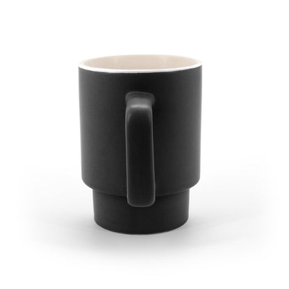 KUERTEN promotional mug in black (detail view) with custom logo branding