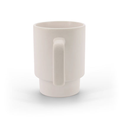 KUERTEN promotional mug in pastel white (detail view) with custom logo branding