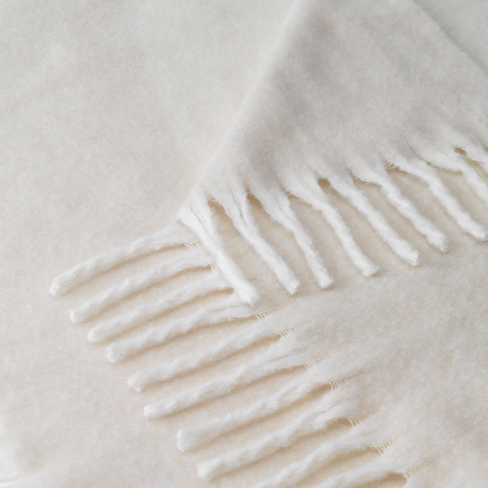 COMFY promotional home textile in beige (detail view) with custom logo branding