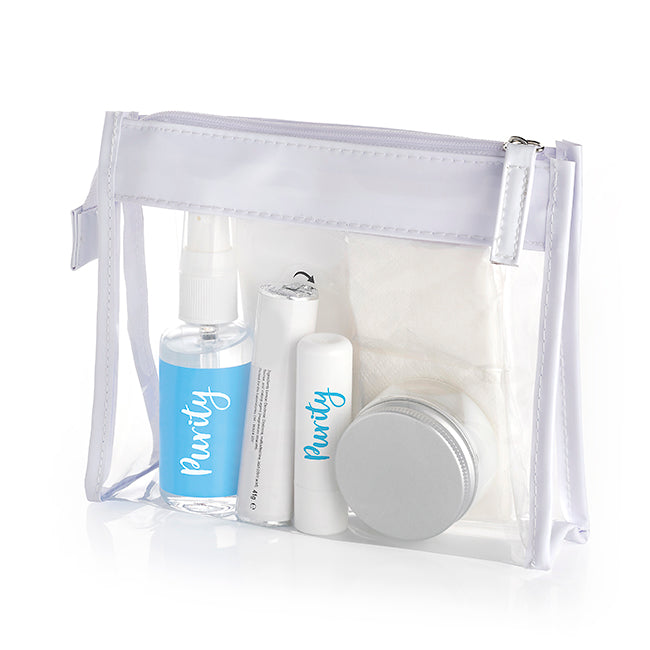 Set benessere in una borsa con finiture bianche in PVC trasparente | Regali benessere firmati